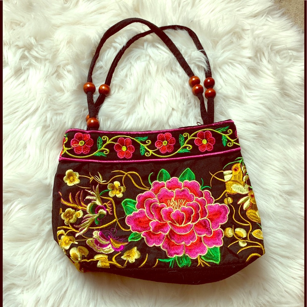 Small embroidered purse with straps